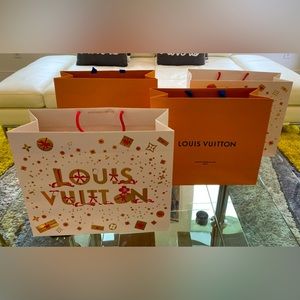 Authentic LV Paper Shopping Bag

Measurements 15.5”x 13.5” x 6.25”